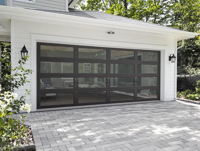 Groton Garage Door Repair design specialist presenting custom garage door options to Groton homeowner