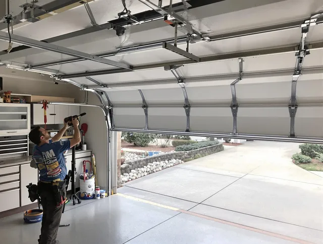 Garage door track repair service by Groton Garage Door Repair in Groton